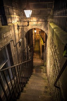 the stairs lead up to an underground passage