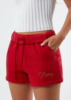 Elevate your loungewear game with our women's Coney Lounge Sweat Short. Designed to become your new favorite staple, these shorts are crafted from soft knit fabric, ensuring ultimate comfort whether you're relaxing at home or running errands. The relaxed fit and elastic waistband provide a cozy and flexible feel, while the Coney chain-stitch embroidery at the hem adds a streetwear flair to the piece. Available in solid white, washed black, or red, each colorway features an embroidered graphic th Chain Stitch Embroidery, Cloud Dancer, Coney Island, Fleece Shorts, Sweat Shorts, Stitch Embroidery, Camping Shirt, Chain Stitch, Casual Wardrobe