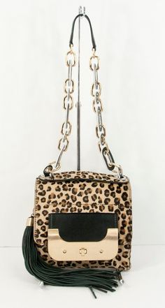 Luxury Box Bag With Chain Strap For Shopping, Elegant Evening Shoulder Bag In Leopard Print, Elegant Leopard Print Party Bag, Leopard Print Rectangular Shoulder Bag With Gold-tone Hardware, Rectangular Leopard Print Shoulder Bag With Gold-tone Hardware, Elegant Leopard Print Shoulder Bag With Detachable Handle, Elegant Leopard Print Shoulder Bag For Travel, Luxury Leopard Print Bags For Formal Events, Luxury Leopard Print Shoulder Bag With Gold-tone Hardware