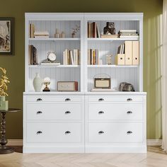 a white bookcase with many books on it