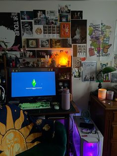 a computer desk with a monitor and keyboard on it