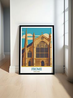 there is a framed poster on the floor in front of a window that reads frome