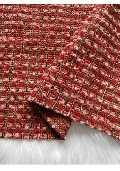 red and brown tweed fabric with white fur