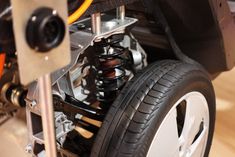 the front wheels and suspensions of a vehicle