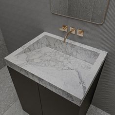 a bathroom sink with a marble counter top in front of a mirror and tiled wall