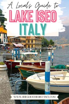 boats docked in the water with text overlay reading a local guide to lake iseo italy