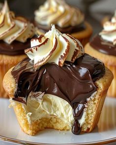 cupcakes with chocolate and white frosting on a plate