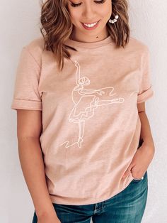 "This dance shirt is perfect for your Dance or Ballet Class, or as a gift for your favorite Dance Instructor, ballerina or dancer in your life! H O W - T O - O R D E R - Be sure to review the size chart in the photos before making your selection.  - Select your size and color from the drop-down menus. - Click the \"Add to Cart\" button, then proceed to check out once you have added all of your items M A T E R I A L S Made from specially spun fibers that a make very strong and smooth fabric that