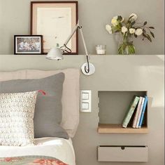 a bedroom with a bed, bookshelf and flowers on the wall above it