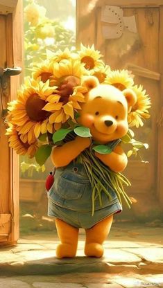 a teddy bear holding sunflowers in its arms