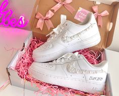 Make your day extra special with these beautiful and unique custom bridal sneakers! * Brand New 100% Authentic sneakers! * FREE SHIPPING within the US territory!  * Rhinestones/pearls Swoosh Bridal Custom made-to-order sneaker. * Hand-painted lettering on the outer sides of each shoe. Get them Personalized! - Size Guide- C (Child) Y (Youth) W (Women) M (Men.) - Acrylic Waterproof paint - ALWAYS Hand-Pianted, we never use stickers to make sure the shoes last a long time! - Available in Low, Mid, and High styles. - 100 % Authentic products purchased from the original retailer - The sizes are unisex so please don't panic if, for example, you order a 6.5 M and receive an 8 W, THEY ARE EXACTLY THE SAME SHOES and will fit the same. Please refer to the Size Guide. - NO RETURNS. Custom shoes are m Luxury White Custom Sneakers With Branded Heel, Luxury Cream Custom Sneakers With Cushioned Footbed, White Custom Sneakers With Rhinestones For Wedding, Custom Wedding Sneakers With Rhinestones, Wedding Custom Sneakers With Rhinestones And Round Toe, Elegant Low-top Sneakers For Bridal Shower, Air Force 1 Wedding, Sneaker Wedding, Wedding Shoes Sneakers