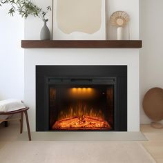 a white fireplace with a fire in it