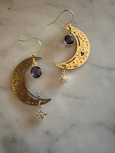 Lightweight Laser cut French wire Amethyst Cheap Moon Charm Drop Earrings, Cheap Dangle Earrings With Moon Charm, Celestial Teardrop Pierced Jewelry, Purple Metal Drop Earrings, Purple Pierced Metal Jewelry, Celestial Crystal Pierced Earrings For Gift, Purple Metal Pierced Jewelry, Purple Metal Crystal Earrings As Gift, Purple Crystal Metal Earrings For Gifts