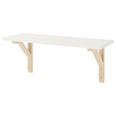 a white table with two wooden legs on the bottom and one leg extended to the side