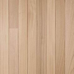 closeup of the wood grains on a wooden surface that is light brown in color