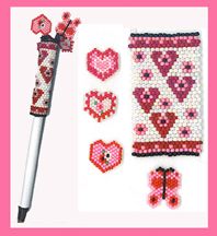 a cross stitch pattern with hearts and flowers on it, next to a crochet kit