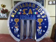 an inflatable sign for a soccer team with the words cup, medals and trophies on it