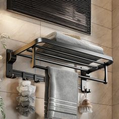 a towel rack with two towels hanging on it