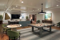 a living room filled with furniture and a pool table in front of a flat screen tv