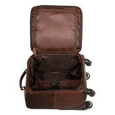 FREE GROUND SHIPPING & FREE MONOGRAMMING! HAND-STAINED BUFFALO LEATHER This 18" carry-on 4-wheeler trolley is made from hand-stained buffalo leather that grows in character and beauty, building a rich patina as it ages. Its main compartment has adjustable straps to keep everything buttoned down securely. The large front compartment has a zippered pocket and open pockets for your accessories. This handmade leather bag features: Telescoping handle Front zipper pocket Front compartment with open po Small Suitcase, 4 Wheeler, Leather Travel Bag, Buffalo Leather, Leather Bags Handmade, Leather Travel, Carry On Bag, Full Grain Leather, Leather Handmade