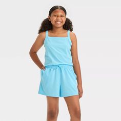 Girls' Woven Romper - All In Motion™ : Target Sleeveless Moisture-wicking Activewear For Loungewear, Moisture-wicking Sleeveless Activewear, Sleeveless Activewear With Adjustable Straps And 4-way Stretch, Sleeveless Summer Activewear With Elastic Waistband, Sleeveless Cotton Jumpsuits And Rompers For Athleisure, Sleeveless Cotton Jumpsuits And Rompers In Athleisure Style, Sleeveless Activewear With Elastic Waistband For Workout, Summer Activewear With Adjustable Straps In Solid Color, Blue Sleeveless Activewear With Built-in Shorts