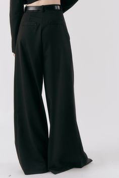 Evie Wide Legged Pants A belt is not included. Tucked front. Product Specification Polyester 80%, Rayon 16%, Spandex 4% Professional Clean Only / Do Not Tumble Dry Model's height is 5′ 7″ (170cm) Bust 32in Waist 23in Hip 35in and wearing S/M Belted Full-length Bottoms For Fall, Solid Color Belted Trousers, Stretch Pants With Belt Loops And Wide Leg, Belted Full-length Pants For Fall, Stretch Wide Leg Pants With Belt Loops, Belted Wide Leg Pants For Fall, Chic Stretch Belted Bottoms, Evening Pants With Belt Loops For Fall, Black Elastane Bottoms With Belt Loops