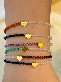 "Gold-filled Heart and Pretty Half and Half Crystals Cute Bracelets. 𝗗𝗲𝘁𝗮𝗶𝗹𝘀 * Gold-filled heart charm and crystal beads are ok to get wet. * Best fit for wrist size 5 to 7.5 inch. * Made in USA 𝗥𝗲𝗰𝗼𝗺𝗺𝗲𝗻𝗱𝗲𝗱 𝗖𝗮𝗿𝗲 No need to clean, safe to get wet, enjoy! 𝗦𝗲𝗻𝗱 𝗮 𝗚𝗶𝗳𝘁 𝗠𝗲𝘀𝘀𝗮𝗴𝗲 You can write a gift message in the \"𝗔𝗱𝗱 𝘆𝗼𝘂𝗿 𝗽𝗲𝗿𝘀𝗼𝗻𝗮𝗹𝗶𝘇𝗮𝘁𝗶𝗼𝗻\" option found right below the drop down menu for \"𝗤𝘂𝗮𝗻𝘁𝗶𝘁𝘆\". There is also a feature called Adjustable Gold Heart Crystal Bracelet, Adjustable Gold Heart-shaped Crystal Bracelet, Adjustable Gold Crystal Heart Bracelet, Adjustable Gold Crystal Bracelet For Valentine's Day, Valentine's Day Gold Crystal Bracelet With Heart Charm, Adjustable Gold Heart Bracelet With Birthstone, Gold Heart-shaped Crystal Bracelet Gift, Gold Crystal Bracelet For Valentine's Day Gift, Gold Spiritual Bracelets With Heart Charm