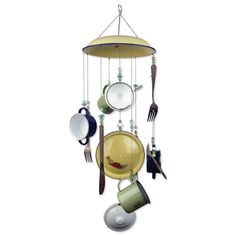 a wind chime with pots and pans hanging from it