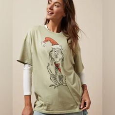 Grinch Christmas Shirt From American Eagle Featuring Max Nwot, Brand New, Never Worn ***Wrinkly Due To Being In Storage Size M, Oversized Grinch Graphic, Grinch Christmas Shirt, Holiday Graphics, Graphic Tee Outfits, Christmas Graphic, Ladies Tee Shirts, Graphic Tops, Grinch Christmas, Mens Outfitters