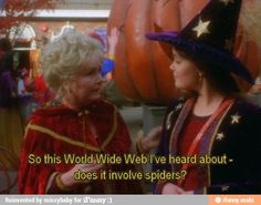 two women in witches costumes talking to each other with the caption, so this world wide web i've heard about - does it involve spiders?