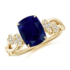 a gold ring with a blue stone and diamonds