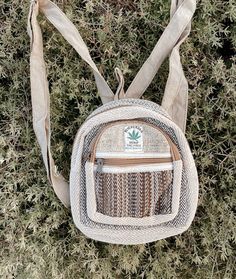 "This mini hippie hemp backpack is the ultimate boho vibe! Perfect for travel, diapers, water, festivals, the beach or grocery store trips! Mini size but holds books, clothing and water! : 9\"x9\" Made with 100% hemp and handcrafted. NOTE: Colors may vary since each is handmade and one of its kind!" School Bag Cute, Concert Bag, Hemp Backpack, Beach Backpack, Summer Backpacking, Concert Bags, Carryon Bag, Boho Travel, Back To School Bags