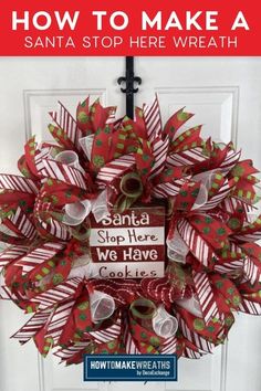 a red and green christmas wreath with words on it that says how to make a santa stop here wreath