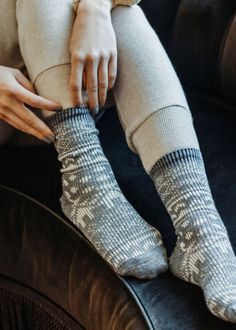 A classic Scandinavian women's boot sock knit with a non-itch wool blend and heavier gauge needles for extra comfort and coziness. Pairs perfectly with your favourite winter boots! Details: Size Guide One size fits most.Recommended Women's US shoe size 6-10, Euro 36 - 41. Materials 54% Polyester, 19% Nylon, 19% Acrylic, 6% Wool, 2% SpandexMade in China Care Instructions Machine wash cold, no chlorine bleach,hang dry recommended. Scandinavian Style Winter Socks With Fair Isle Pattern, Nordic Knitted Winter Socks, Winter Nordic Knitted Socks, Winter Knitted Socks For Stocking Stuffers, Comfortable Winter Socks With Fair Isle Pattern, Comfortable Fair Isle Pattern Winter Socks, Warm Snug Socks For Stocking Stuffer, Warm Comfortable Winter Socks, Comfortable Knitted Gray Socks