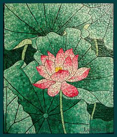 a pink flower sitting on top of a green leaf covered ground next to water lilies