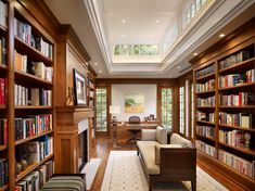 a living room filled with lots of books