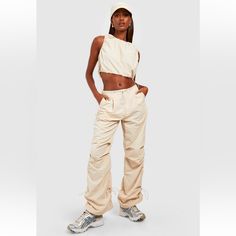 Beige Cargo Pants W| Cord Pull Toggle Waist. Bnwt. Ruched Style. Adjustable Toggles At Bottom Hems As Well For Skinnier Fit. Back Flap Pockets. Can Be Dressed Up Or Down. No Stretch. Sz. 12. Suggested Size Between 10-12. Looks Great With Heels Or Sneakers. Cute Cargo Pants, City Streetwear, Parachute Cargo Pants, Beige Cargo Pants, Cargo Pants For Women, Parachute Cargo, Beige Cargo, Style Cargo, Inner City