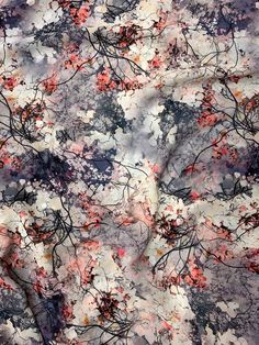 an abstract painting with red, black and white flowers on it's surface is shown