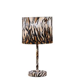 a zebra print lamp on a white background