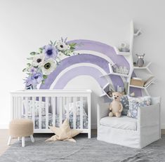 a baby's room decorated in lavender and white