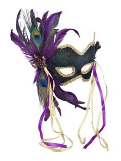 a masquerade mask with feathers and ribbons