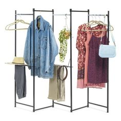 an open rack with clothes and handbags hanging on it