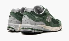 The New Balance 2002R “Jade Green” is a green-based colorway of the retro performance running and lifestyle shoe by the heritage footwear brand.  The New Balance 2002R was introduced back in 2010 before returning to the scene as a retro shoe in more recent years.  Appearing in “Jade Green,” this versatile look for the New Balance 2002R is complete with the green hue on its pig suede overlays and tonal mesh base.  A silver “N” logo is found on both sides of the shoe and grey “2002R” branding appe New Balance 2002, Bape Shoes, Alternative Shoes, New Balance 2002r, N Logo, Shoe Wishlist, Clothing Outfits, Retro Shoes, Green Shoes