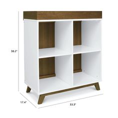 a white and brown bookcase with three shelves