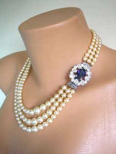 Website: https://www.boudoir-prive.co.uk Beautiful vintage Great Gatsby, Art Deco style Pompadour simulated glass pearl and Montana sapphire blue rhinestone bridal choker necklace. This stunning choker necklace comprises three strands of high quality graduated cream glass simulated Pearl And Emerald Necklace, Green Pearl Necklace For Wedding, Formal Green Pearl Necklaces, Pearl Emerald Necklace, Pearl And Emerald Choker, Pearl Choker Wedding, Emerald Green Stone, Bride Necklace, Bridal Choker