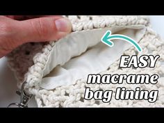 someone is holding the zipper open to show how to crochet an easy purse