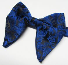 Beautiful pre-tied and adjustable double tiered banded bow tie Velvet Will adjust from 13" through 20" neck. Bow dimensions 3.25" x 4.5". Bow tie Always made by hand and to your special order. Weddings and groups are welcome. Elegant Blue Adjustable Bow Tie, Blue Bow Tie With Butterfly Knot For Formal Events, Blue Adjustable Bow Tie And Suit Accessories, Blue Bow Suit And Tie Accessories For Formal Occasions, Adjustable Blue Bow For Formal Occasions, Blue Formal Suit And Tie Accessories With Decorative Bow, Blue Adjustable Bow With Ties, Adjustable Blue Bow Ties, Adjustable Blue Bow With Ties