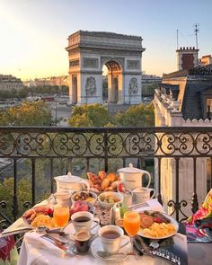 breakfast on the balcony overlooking the arc de triumph