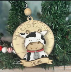 a christmas ornament with a cow on it