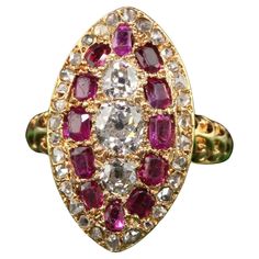 Beautiful Antique Victorian 18K Yellow Gold Old Mine Diamond and Ruby Navette Ring. This incredible Victorian diamond and ruby ring is crafted in 18k yellow gold. This ring features three old mine cut diamonds in the center that around surrounded by a row of natural Burmese rubies and an outer row of rose cut diamonds. The ring is in great condition and sits low on the finger. Item #R1911 Metal: 18K Yellow Gold Weight: 5.3 Grams Size: 6 1/4 Diamonds: Approximately 1 cts Color: H Clarity: VS2 Rubies: Approximately 1 ct Measurements: Top of the ring measures 21.87 mm wide and band measures 2.1 mm wide. Measurements off the finger: 5.66 mm high Layaway: For your convenience, we will be happy to provide layaway payment options. Please contact us to work out a layaway plan which best suits your Diamond And Ruby Ring, Victorian Diamond Ring, Victorian Engagement Rings, Antique Diamond Rings, Ruby Engagement Ring, Art Deco Engagement, Antique Engagement, Deco Engagement Ring, Antique Engagement Rings